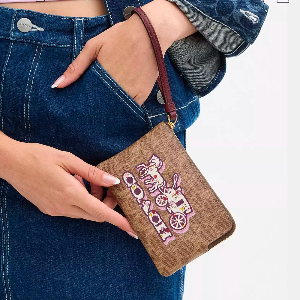 Coach Corner Zip Wristlet In Signature Canvas With Horse And Carriage Print